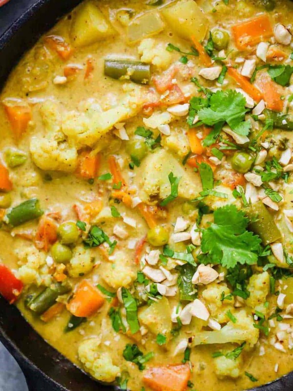 Vegetable Korma Curry straight from the stove served in a cast iron pan