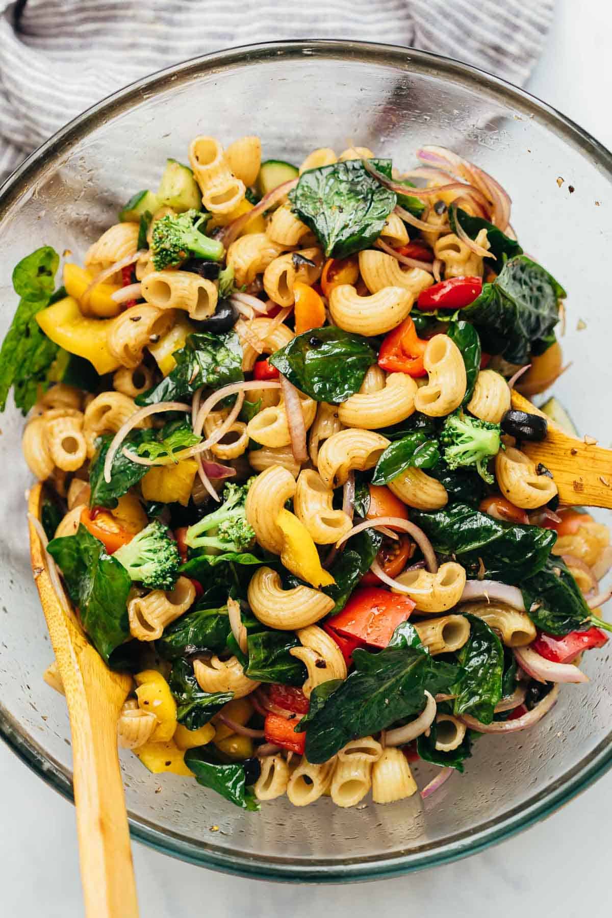 Vegan Pasta Salad tossed in a large mixing bowl ready to be served