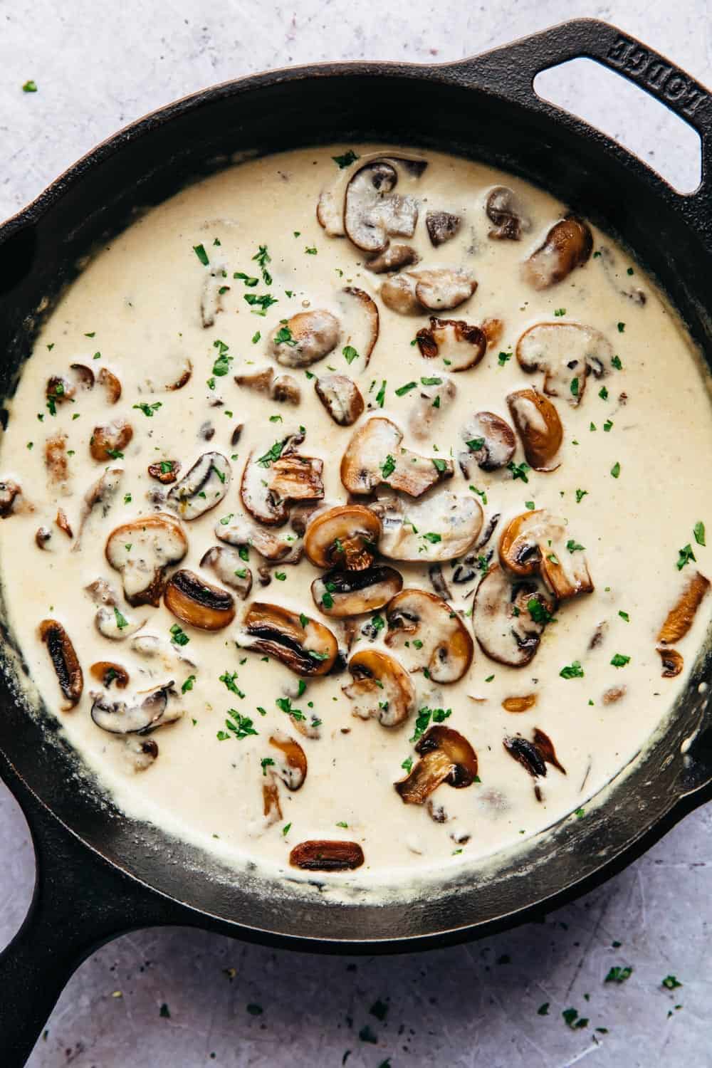Creamy parmesan mushroom sauce in the pan, ready to be served
