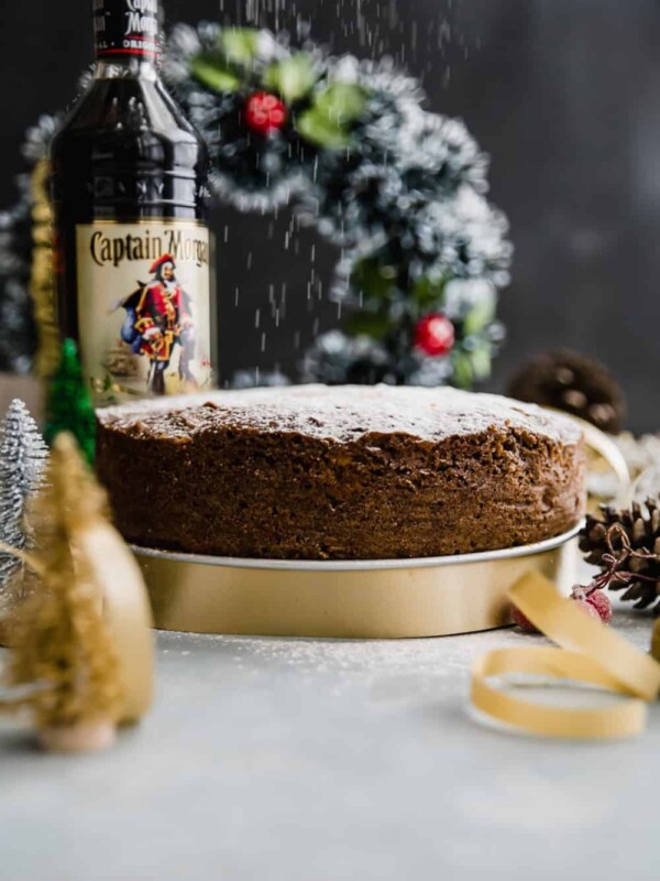Last minute plum cake or christmas fruit cake set up on the table for slicing