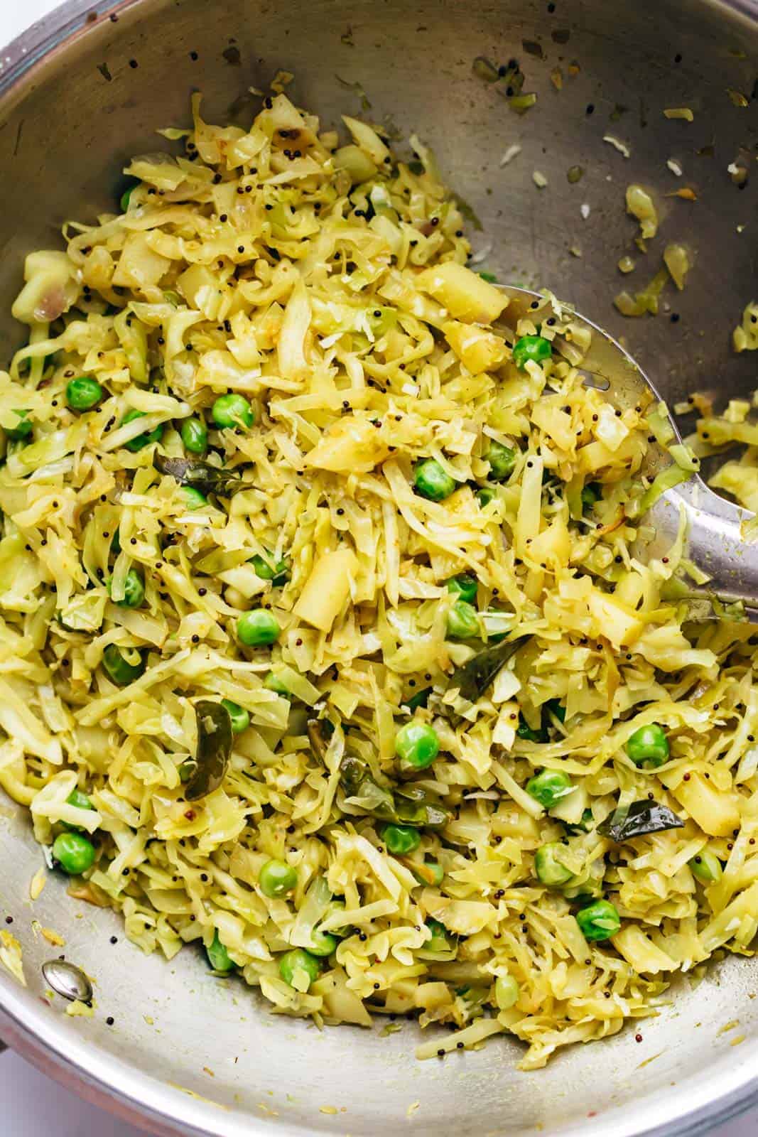Potato Cabbage fry in a kadhai straight from the stove
