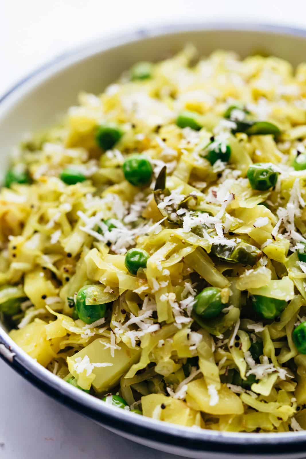 Close up of potato cabbage fry served in a bowl