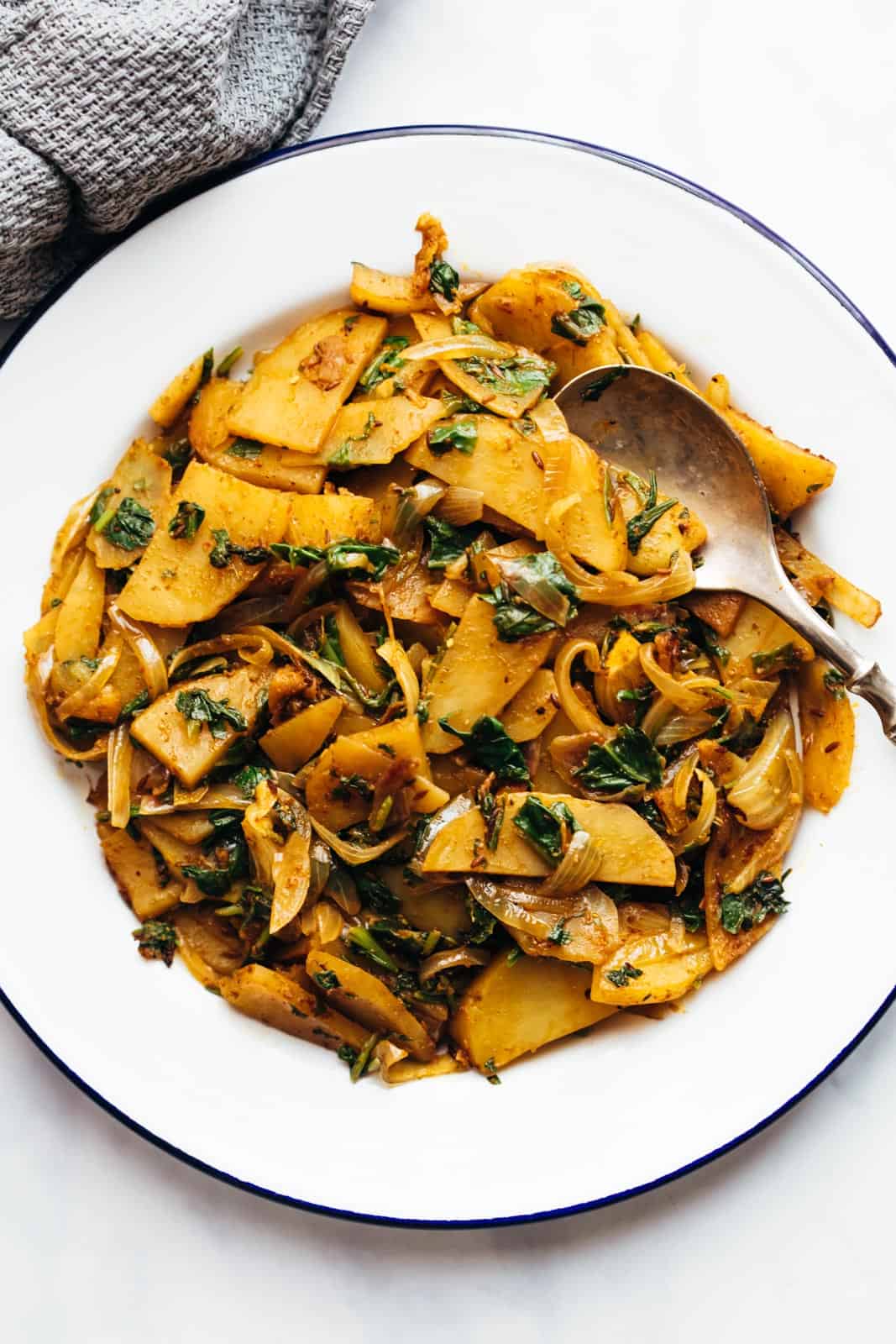 Quick aloo palak served in a bowl