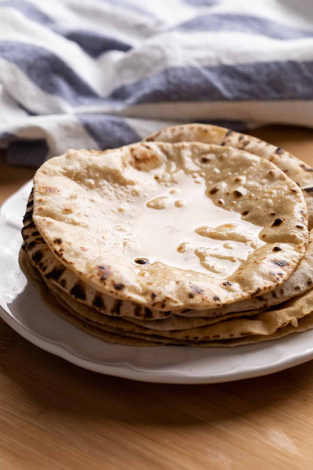 Soft rotis smeared with ghee
