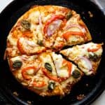No yeast Pizza cooked on a cast iron skillet