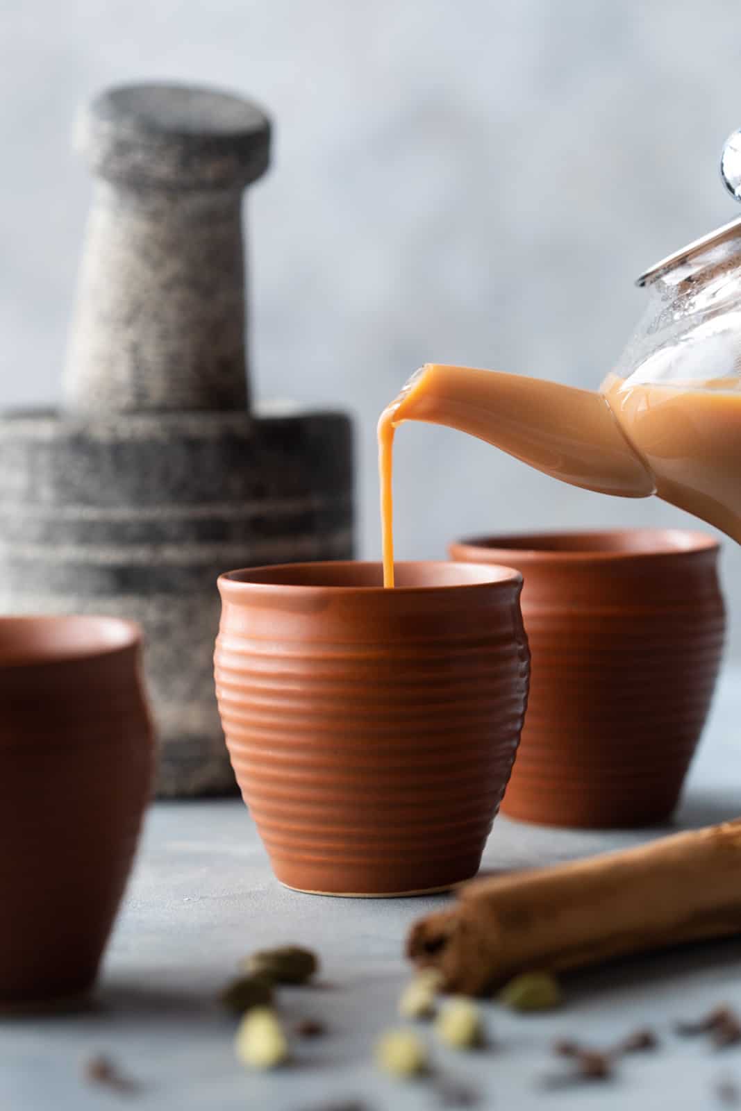 Pouring tea into cups
