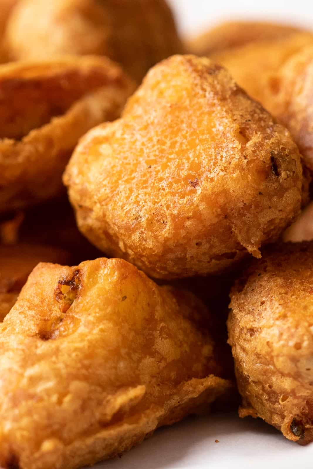 Closeup to show the crispy batter of paneer pakoras