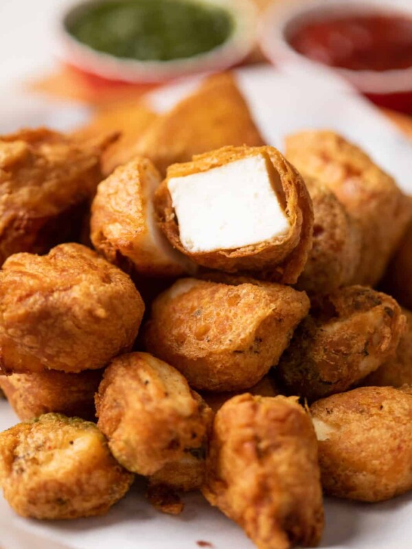 Closeup of a bite of plain paneer pakora