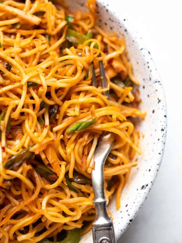 Picture of a fork with noodles twirled around it