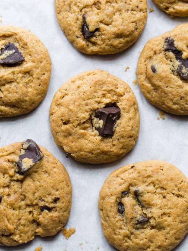 Eggless chocolate chips cookies freshly baked on a cookie sheet