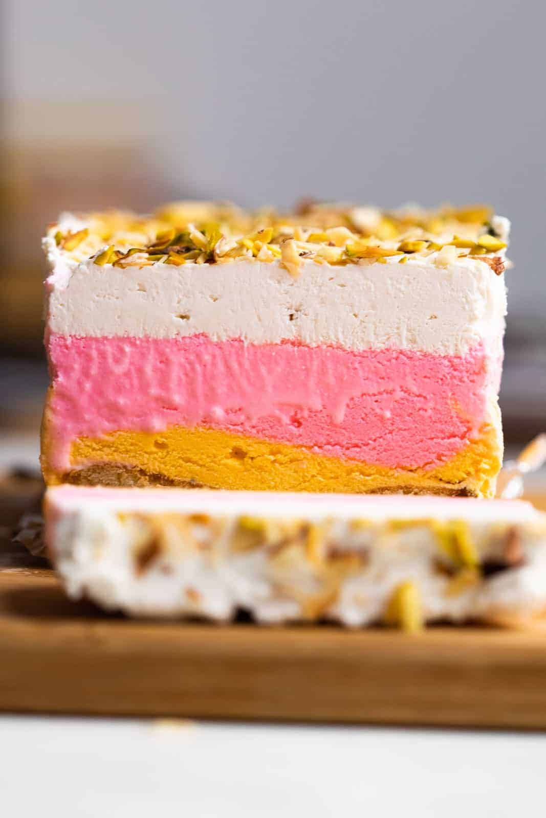 Classic Cassata sliced on a worktop showing all the four layers