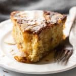 Close up of a slice of dundee cake to showcase the moist crumb