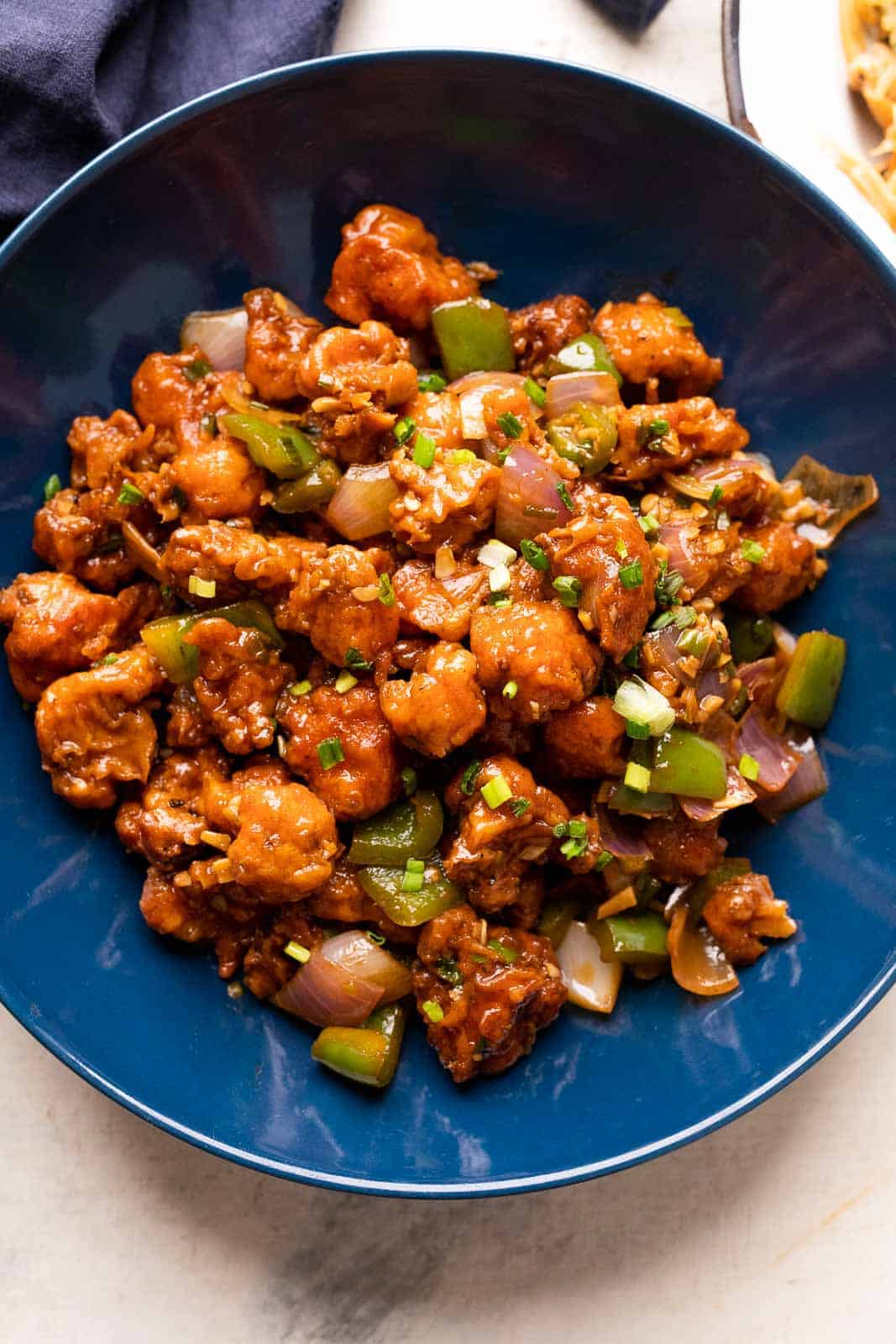 Gobi manchurian served in a blue bowl