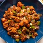 Gobi manchurian served in a blue bowl