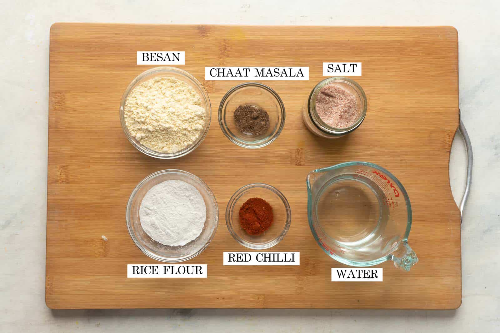 Picture of all the ingredients for the mirchi bhajiya batter