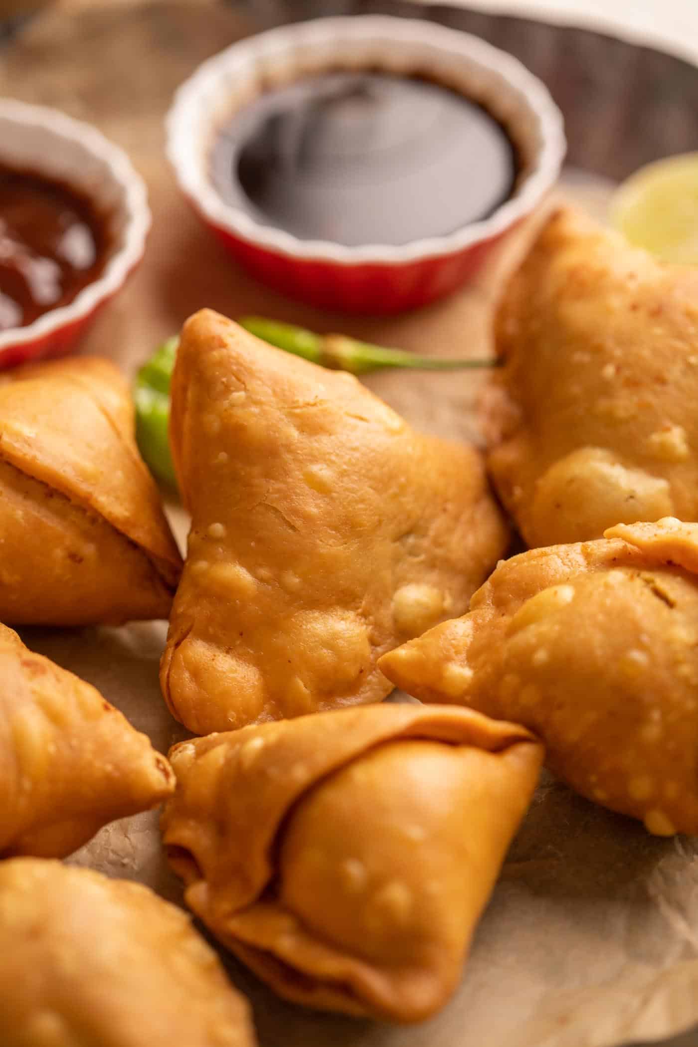 Closeup of a beautiful, perfect golden brown samosa