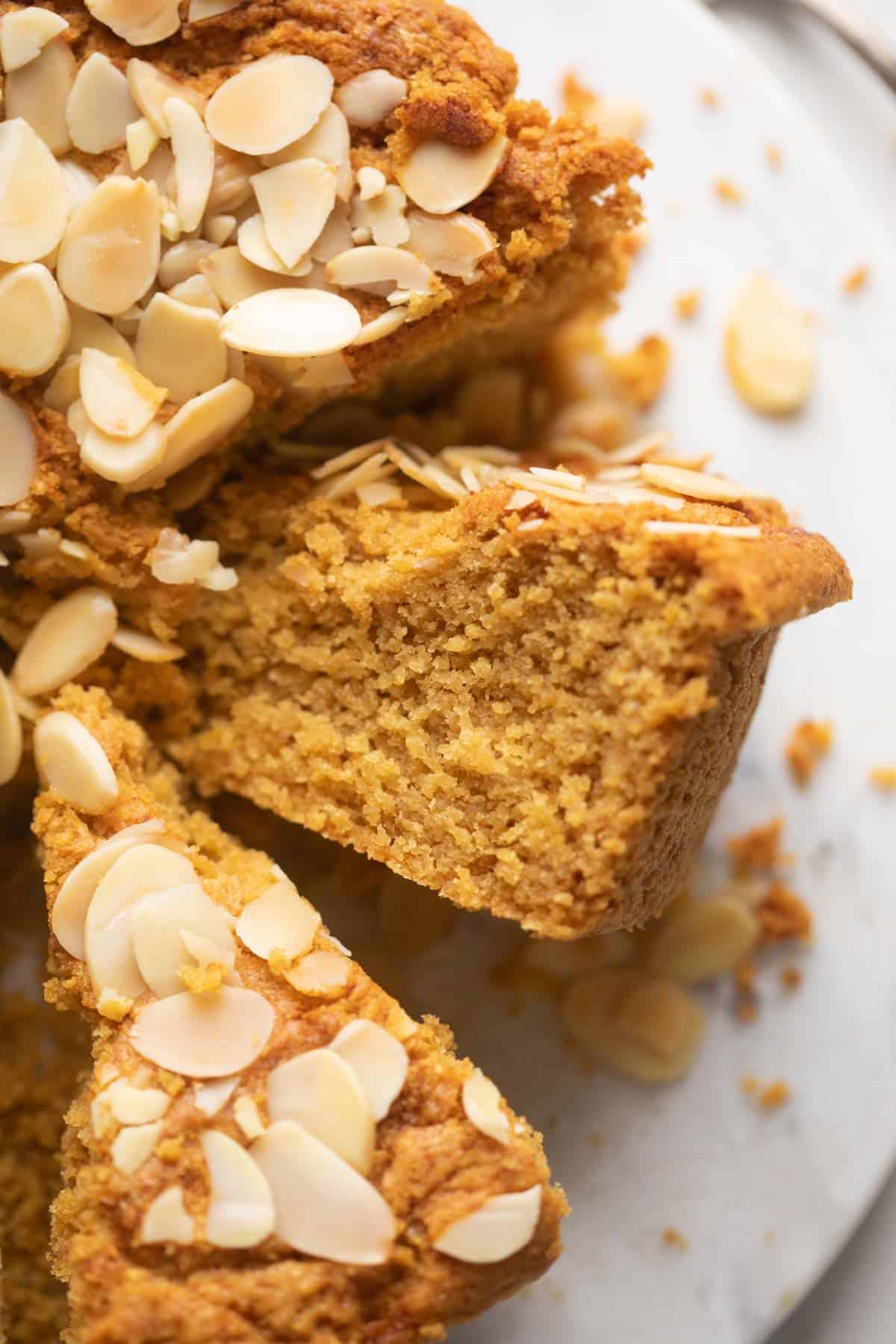 Closeup of a slice of mawa cake to show the texture of the crumb