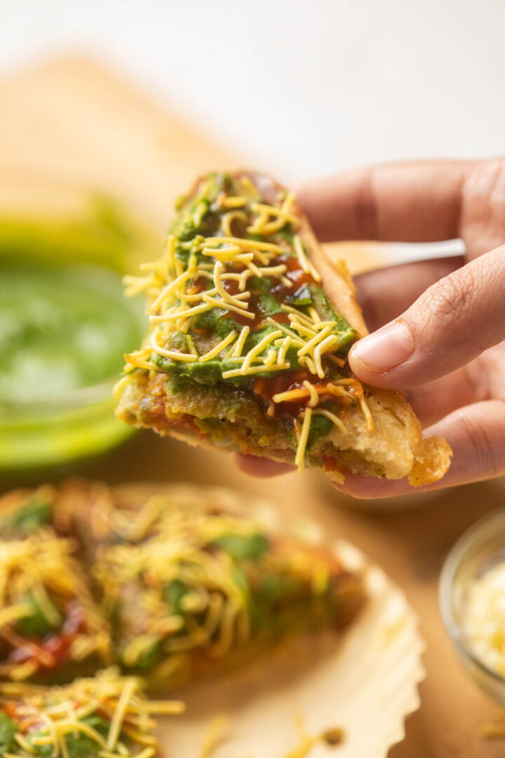 Close up of a slice of bombay sandwich