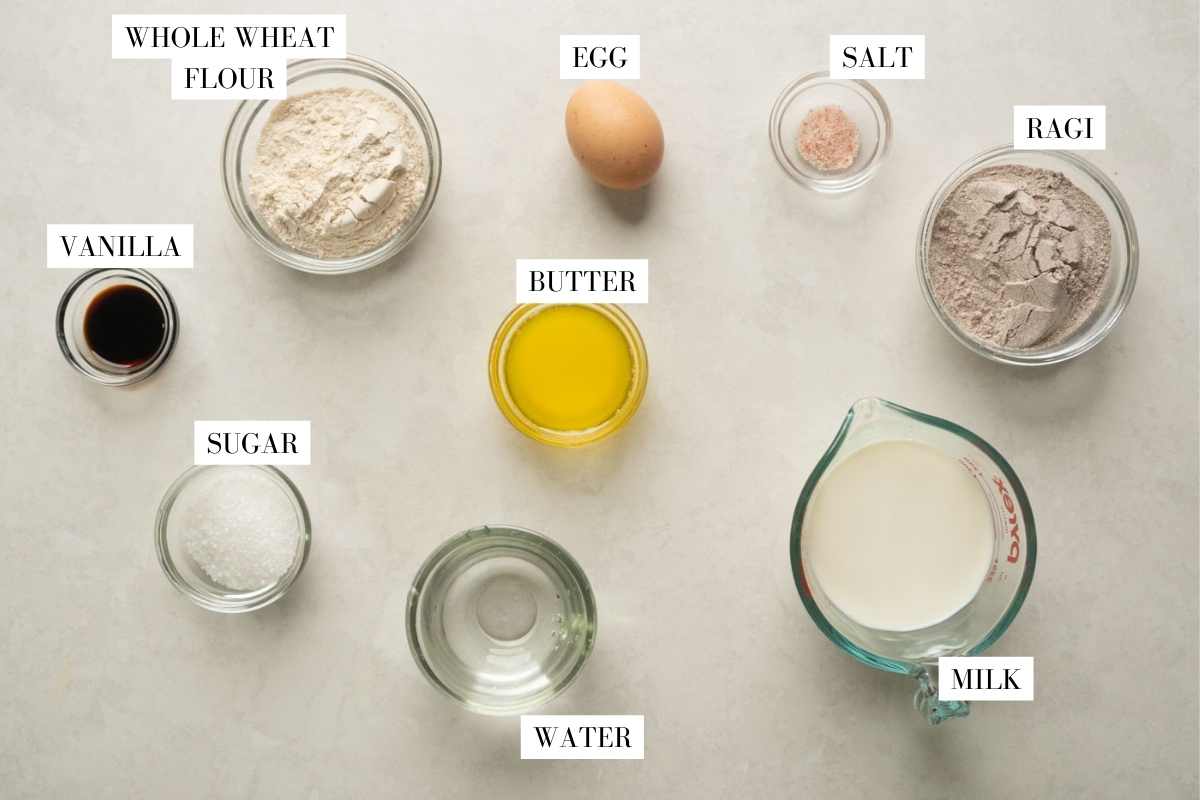 Picture of all the ingredients you need for ragi crepes with text to identify them