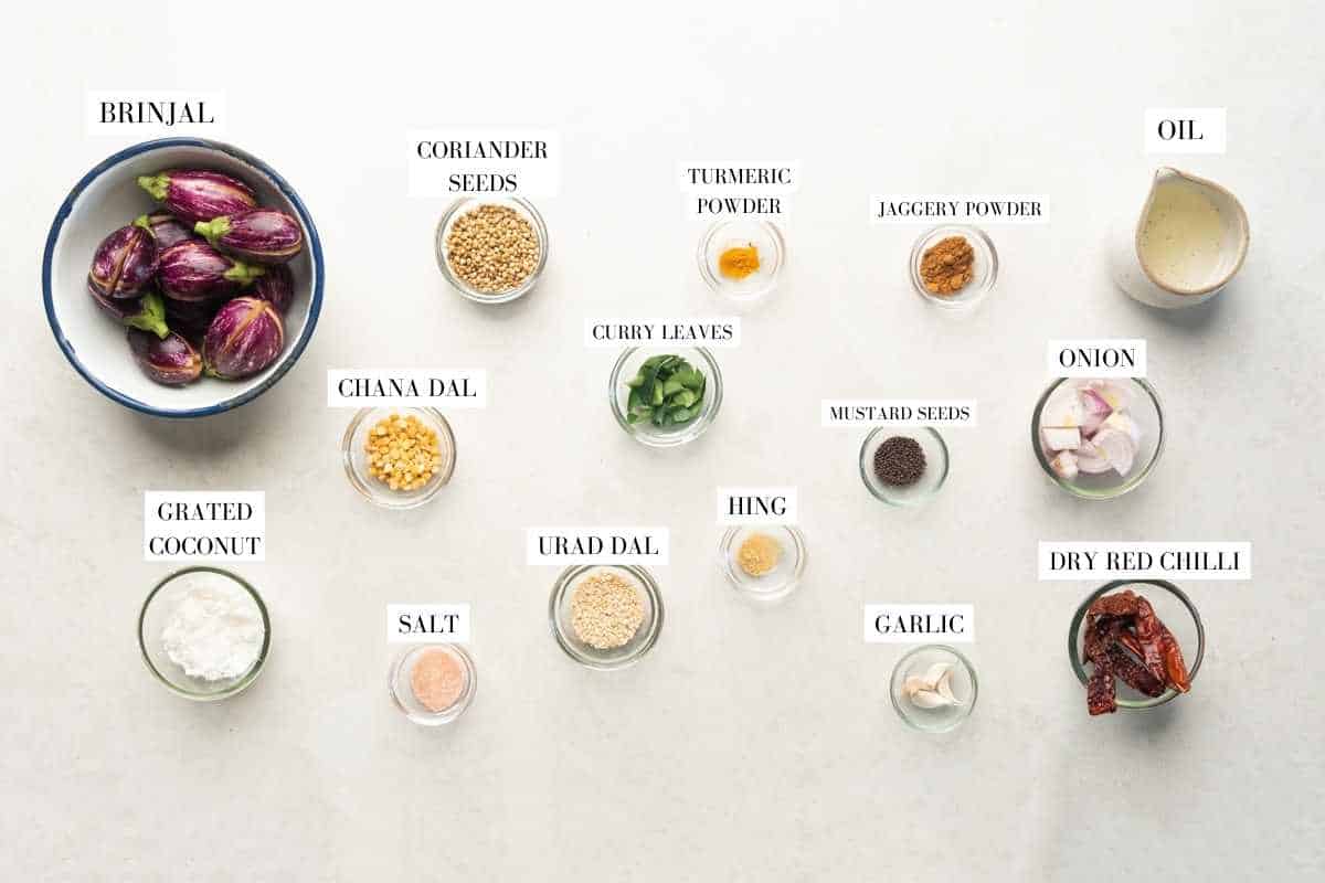 Picture of all the ingredients required for the air fryer stuffed baingan with text to identify them