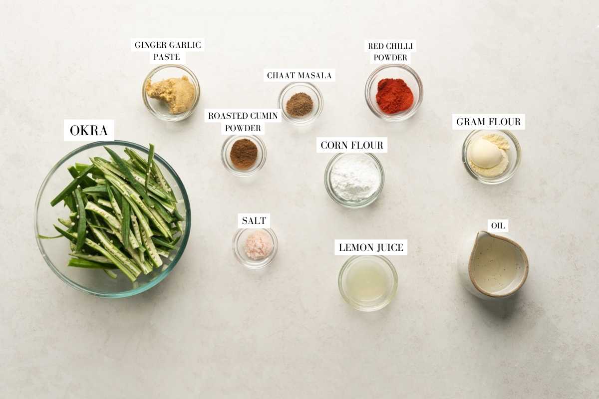 Picture of all the ingredients required for the air fryer kurkuri bhindi with text to identify them