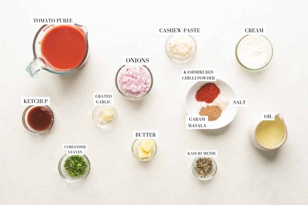 Picture of all the ingredients for Instant Pot Chicken Tikka Masala with text to identify them