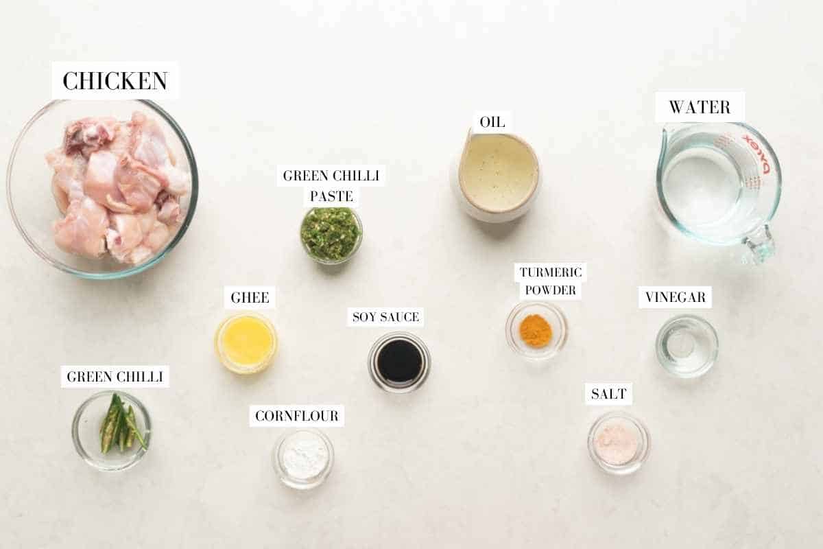 Picture of all the ingredients fo andhra chilli chicken with text to identify them