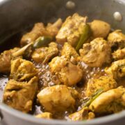 shot of andhra chilli chicken in a kadai