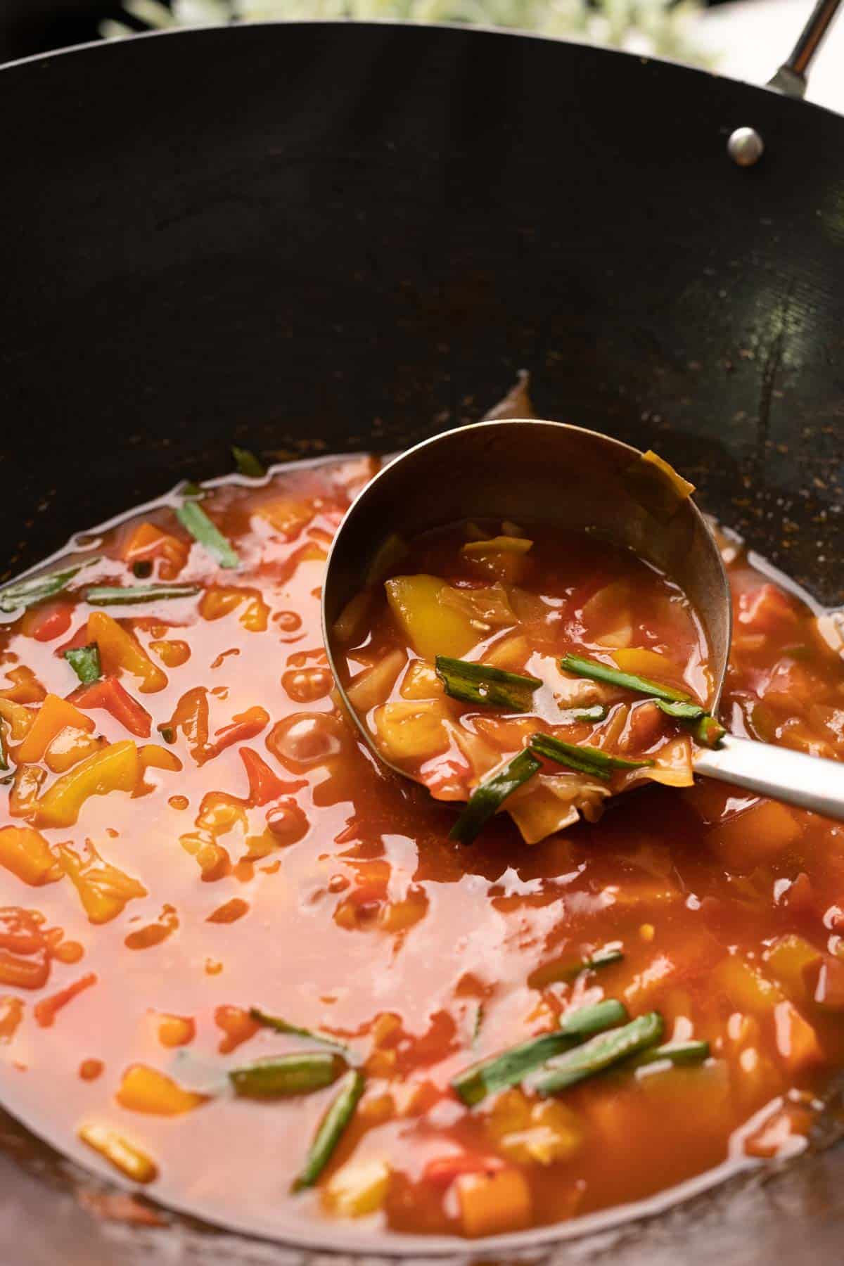a shot of sweet and sour veggies in the wok