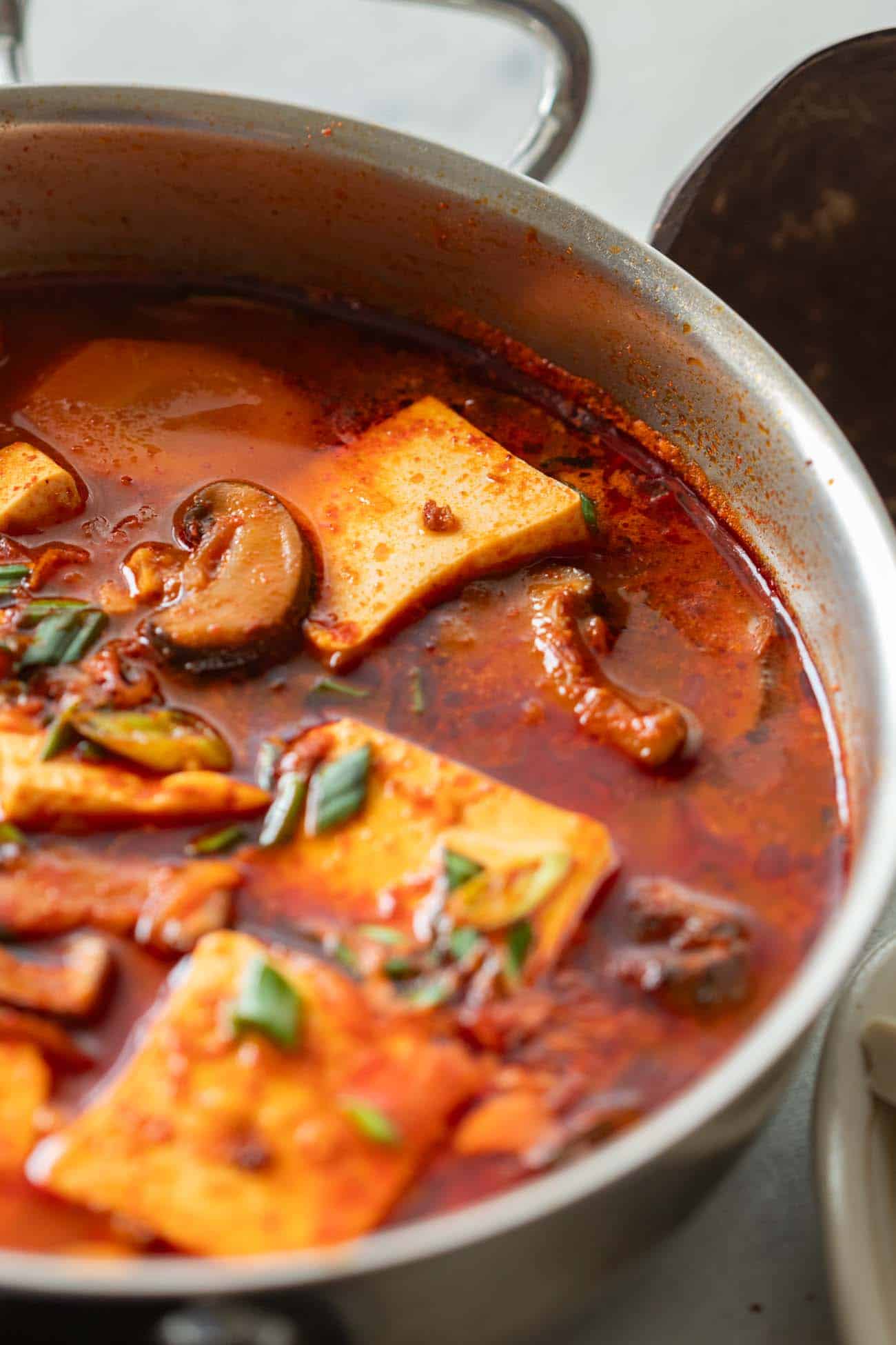 korean soft tofu stew in a white bowl