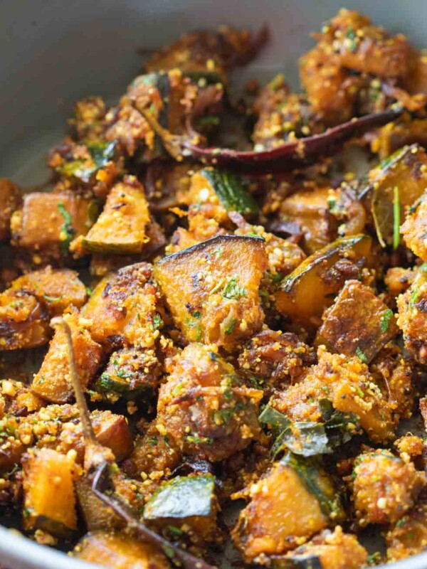 peanut pumpkin sabzi in a grey kadai garnish with coriander leavese