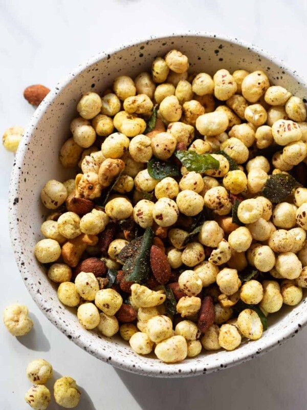Roasted Makhana and Nuts served in a white bowl