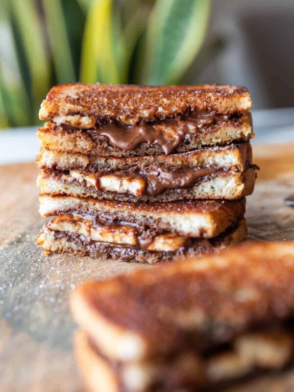 grilled chocolate banana sandwich on a wooden board