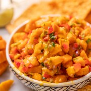 close up of mango salsa to show it's fresh and juicy texture