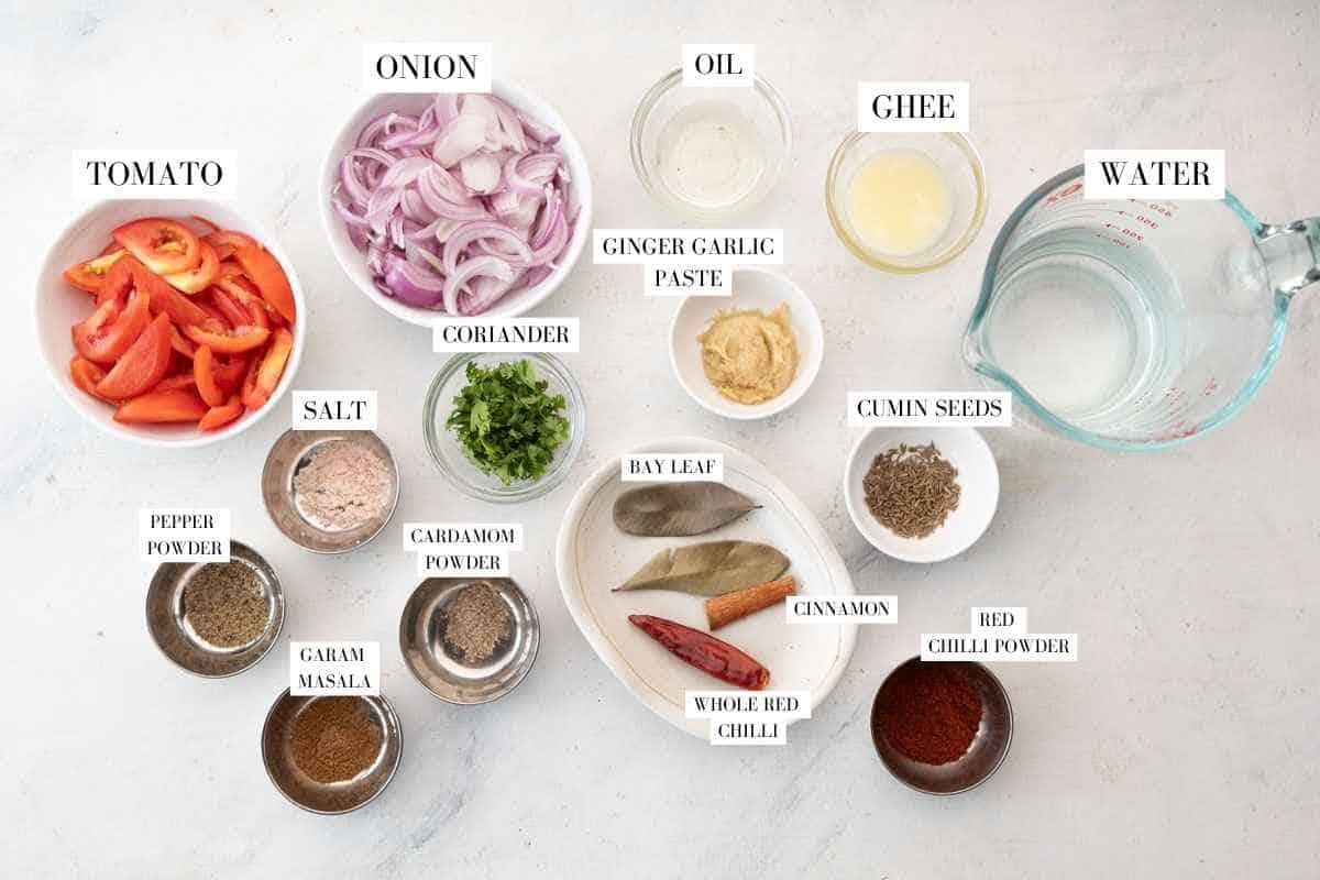 Ingredients for Pressure Cooker chicken curry gravy with text overlay
