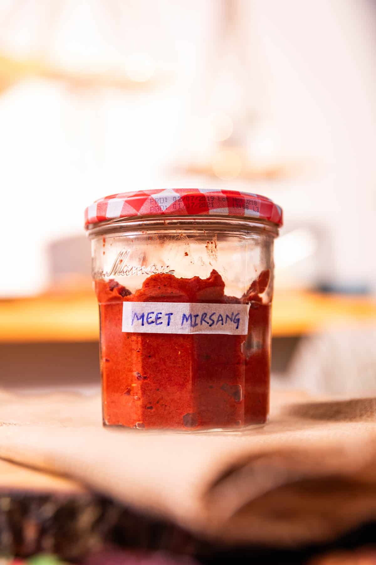 meet misrang or Mangalorean fish fry in a labeled glass jar