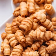 a close up image of kulkuls to show the crispy texture