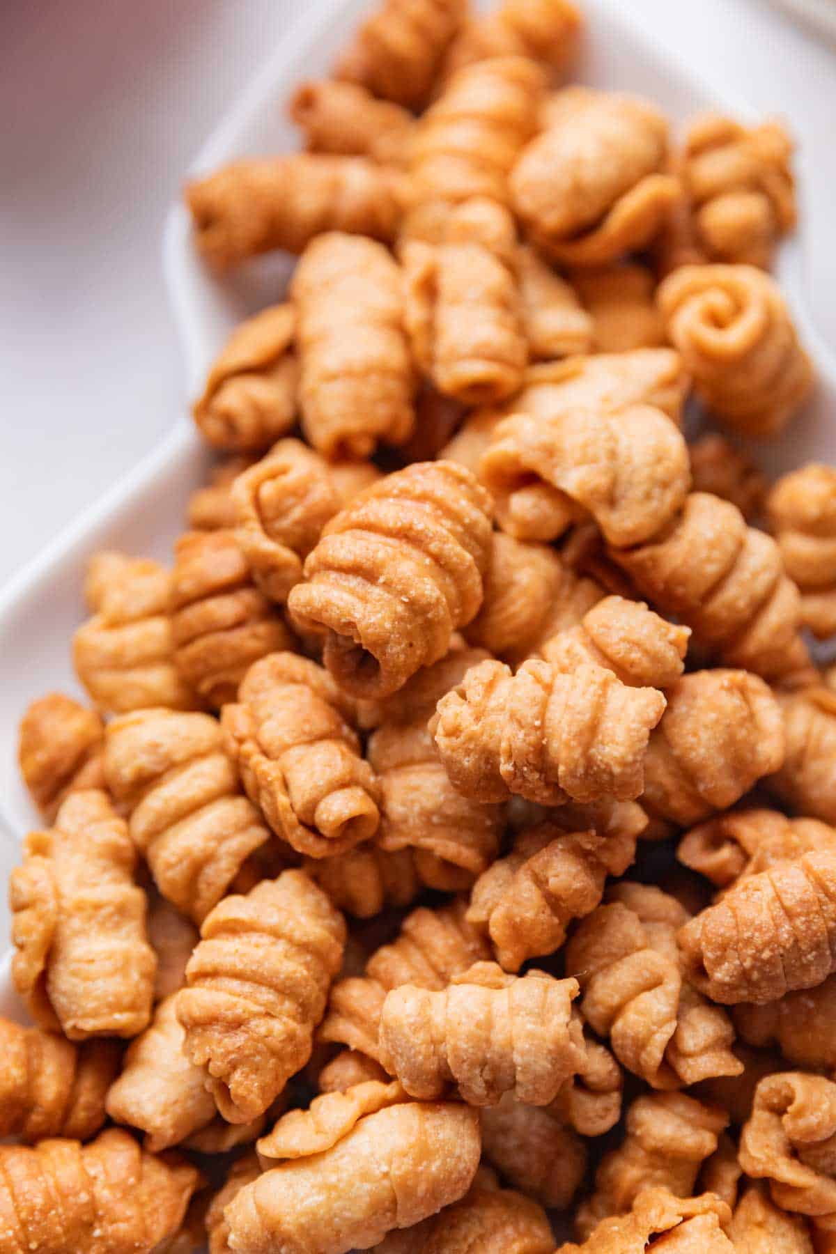 a close up image of kulkuls to show the crispy texture