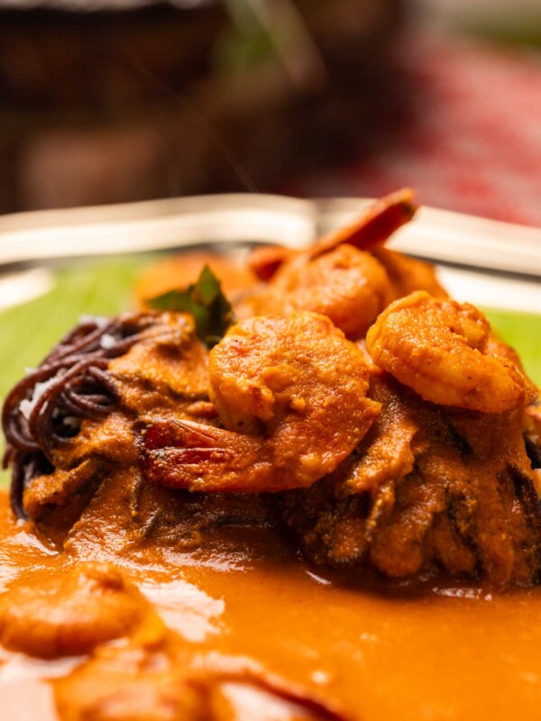 mangalorean prawn curry topped on ragi idiyappam