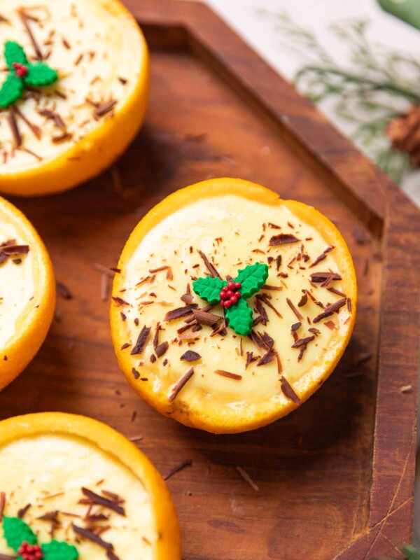 a close up image of orange posset dessert