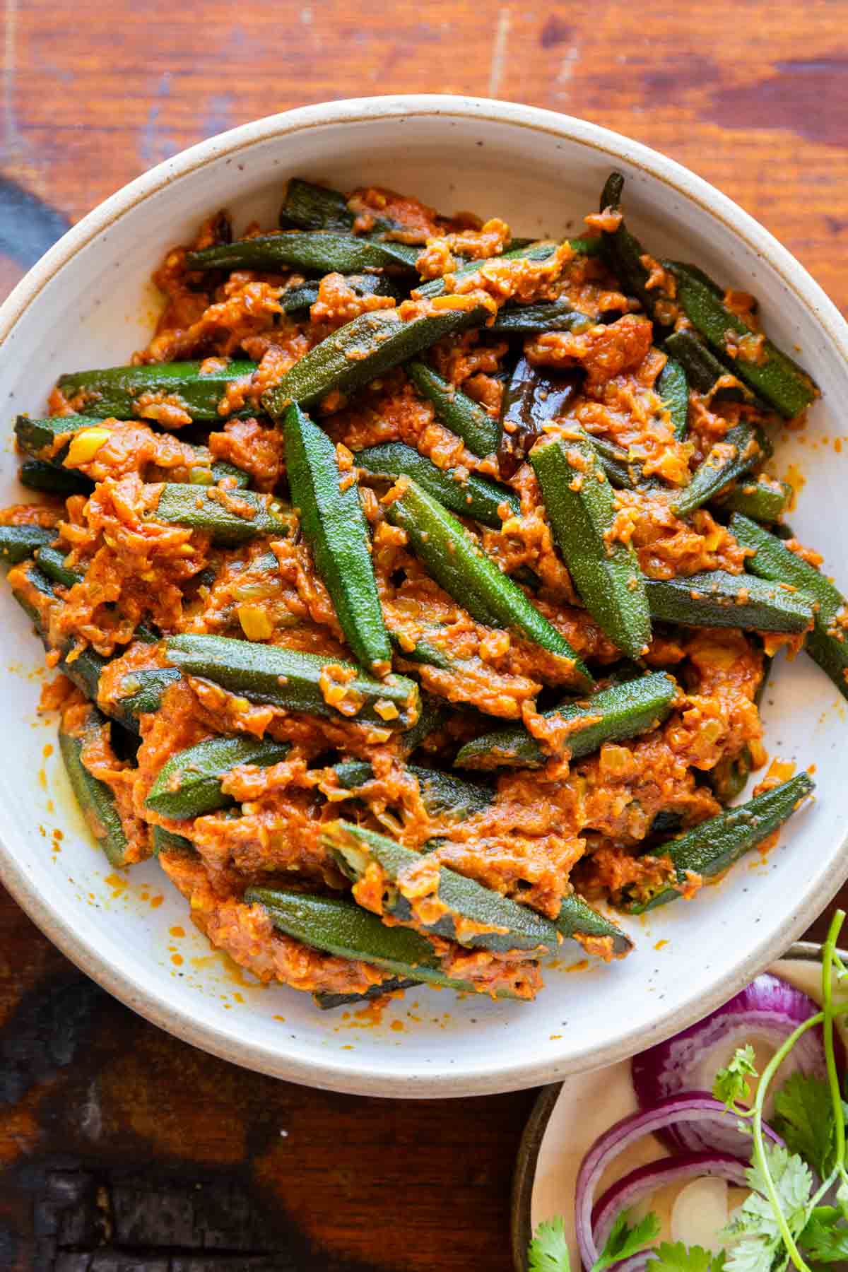 bhindi masala dhaba style served in a white bowl