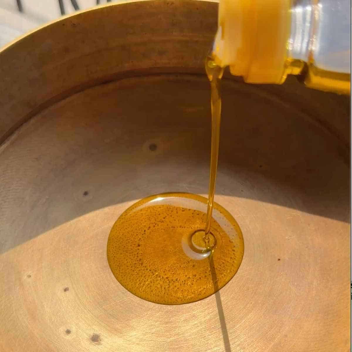 dahi tadka recipe - step 1 - heat mustard oil