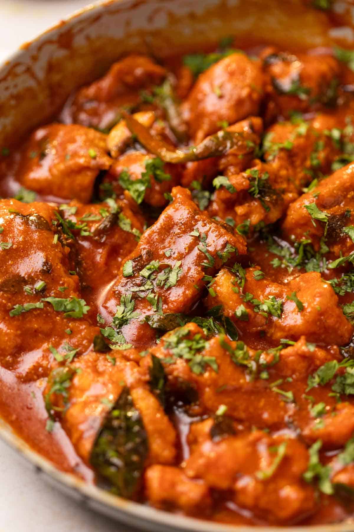 Apollo fish garnished with coriander and served in a bowl