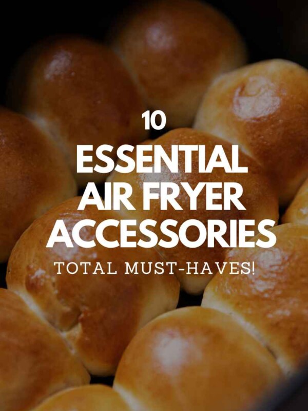 an image of air fryer dinner rolls still in the air fryer basket with text overlay