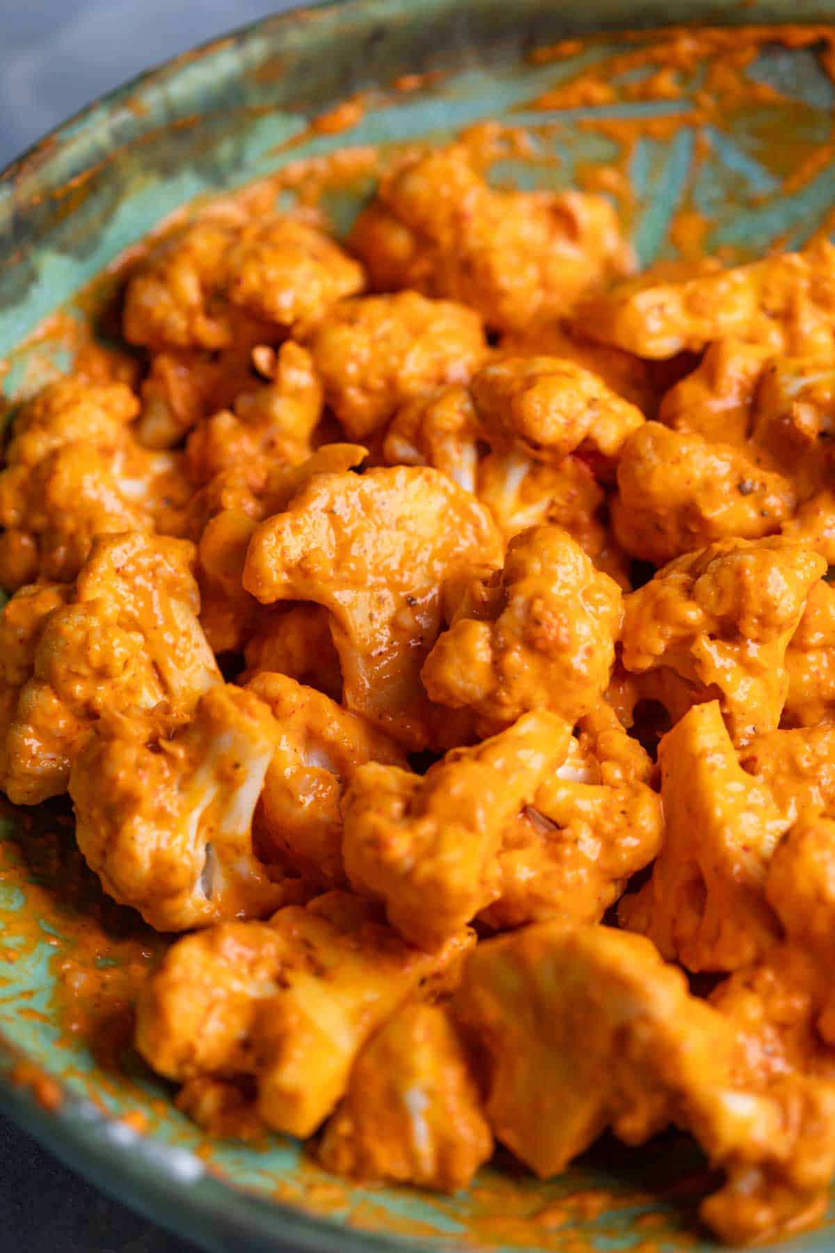 marinated cauliflower florets ready for frying