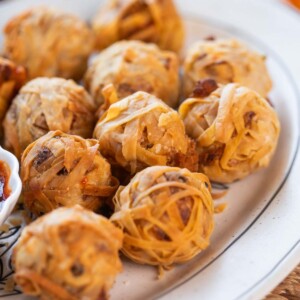 a close up image of firecracker crispy potato balls to showcase it's texture