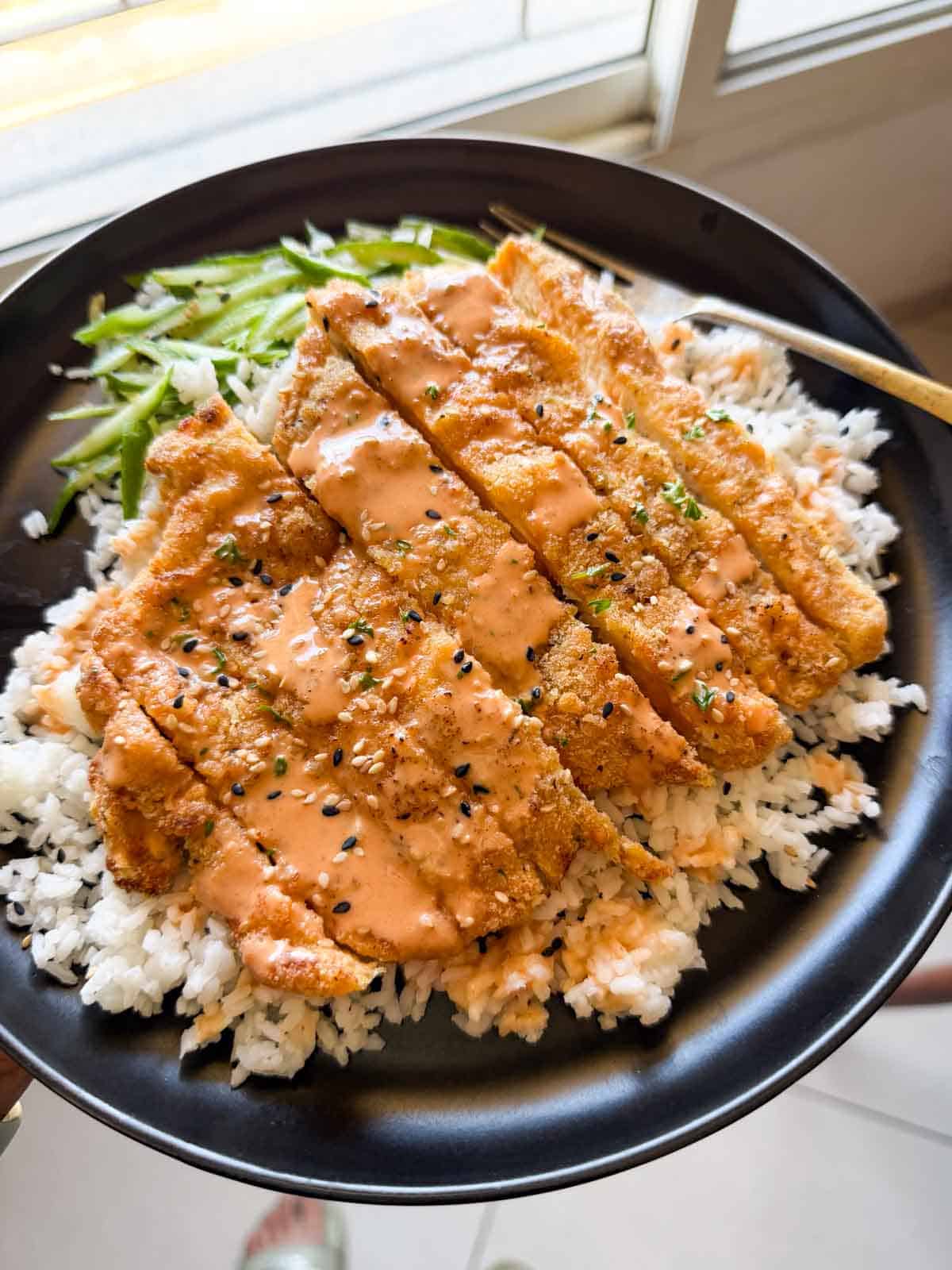 chicken katsu rice bowl served with accompaniments