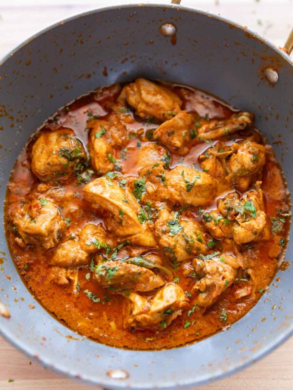 Dahi chicken pictured in the kadhai its cooked in